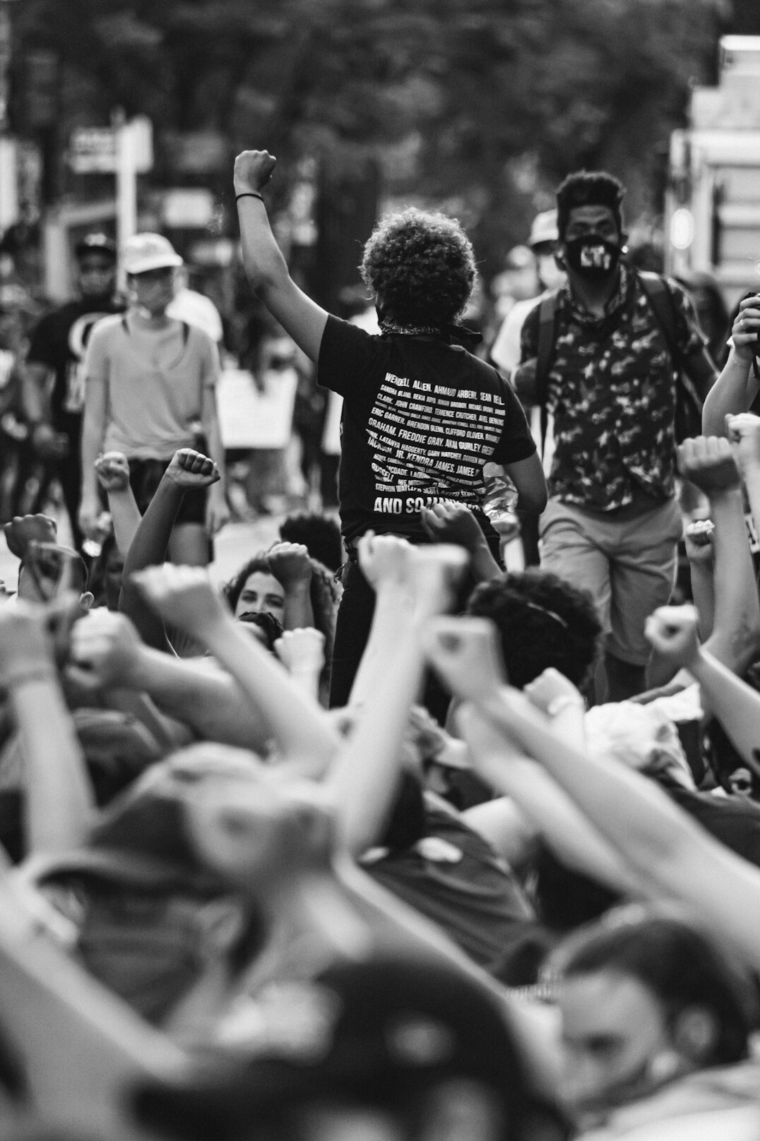 people protesting in street