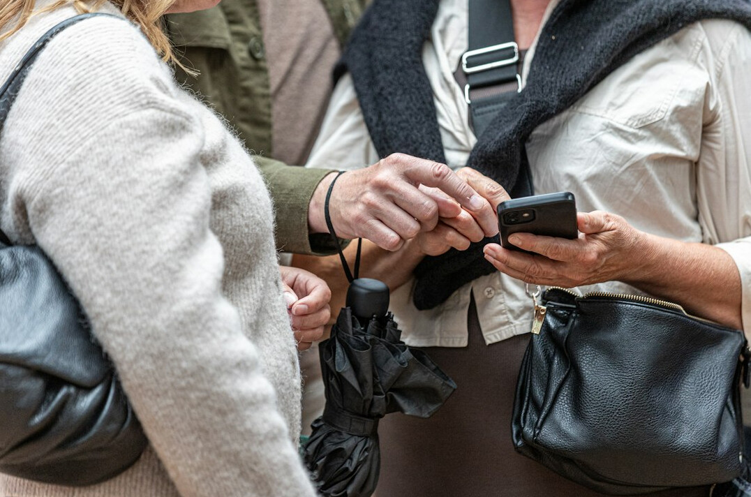 people scrolling on smartphones