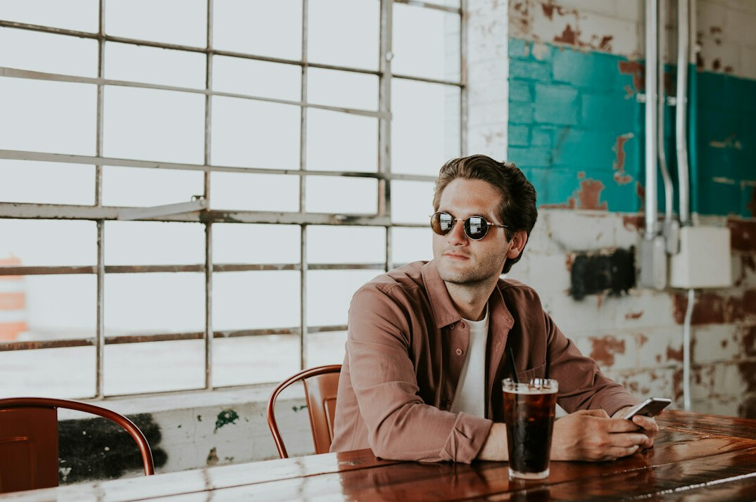Studio portrait of a German man with glasses